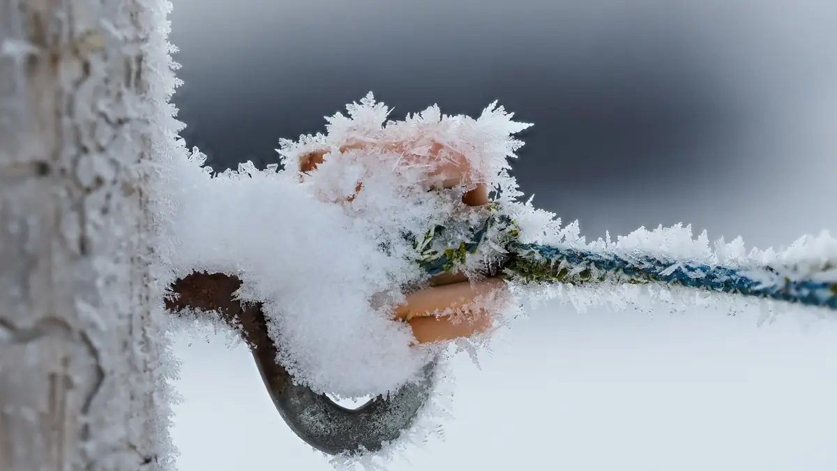 A frost-covered outdoor valve in the snow - Wall Leak Detection in Caldwell